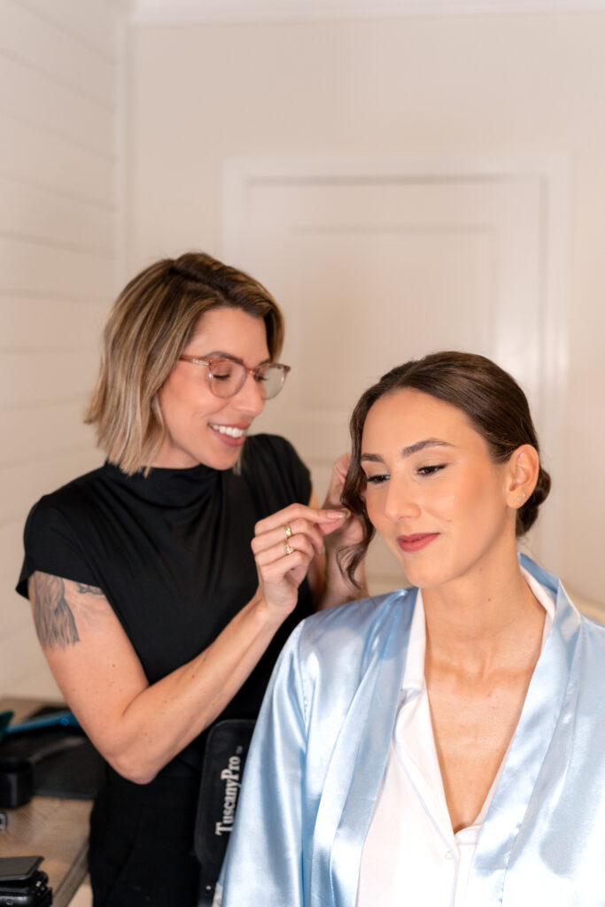 Bridal makeup and hair Orlando | Makeup Artist Orlando Beauty Brigade | Mandi applying makeup to a bride