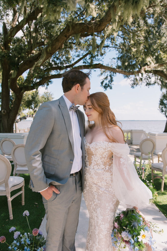 Orlando wedding makeup artist | Makeup Artist Orlando Beauty Brigade | Groom kissing bride on the forehead