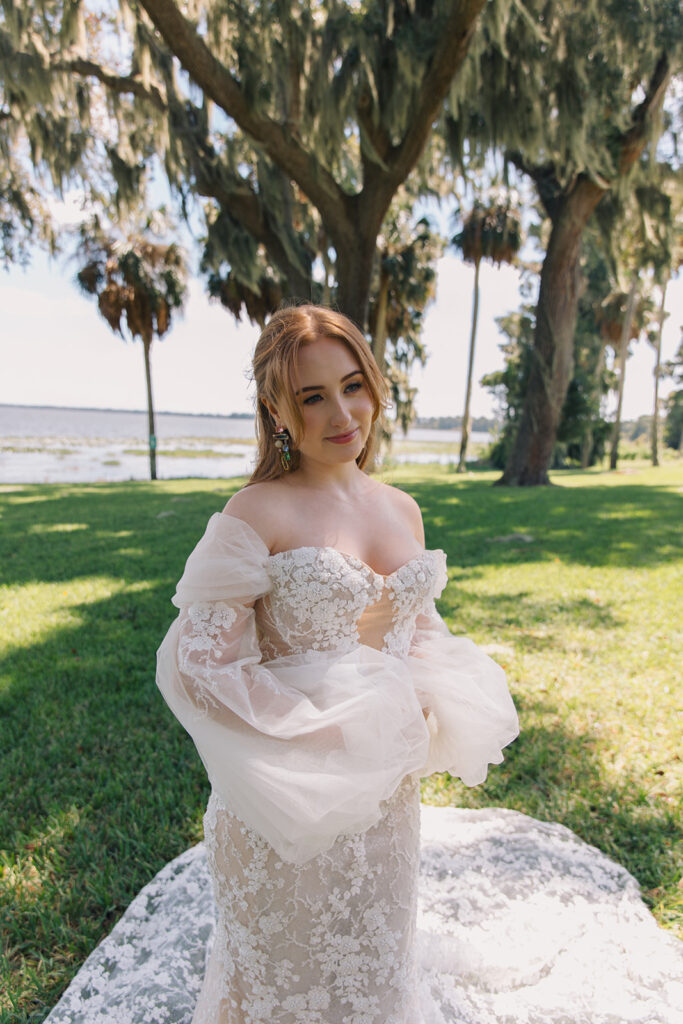 Orlando wedding makeup artist | Makeup Artist Orlando Beauty Brigade | Bride in a half up half down wearing an off shoulder gown