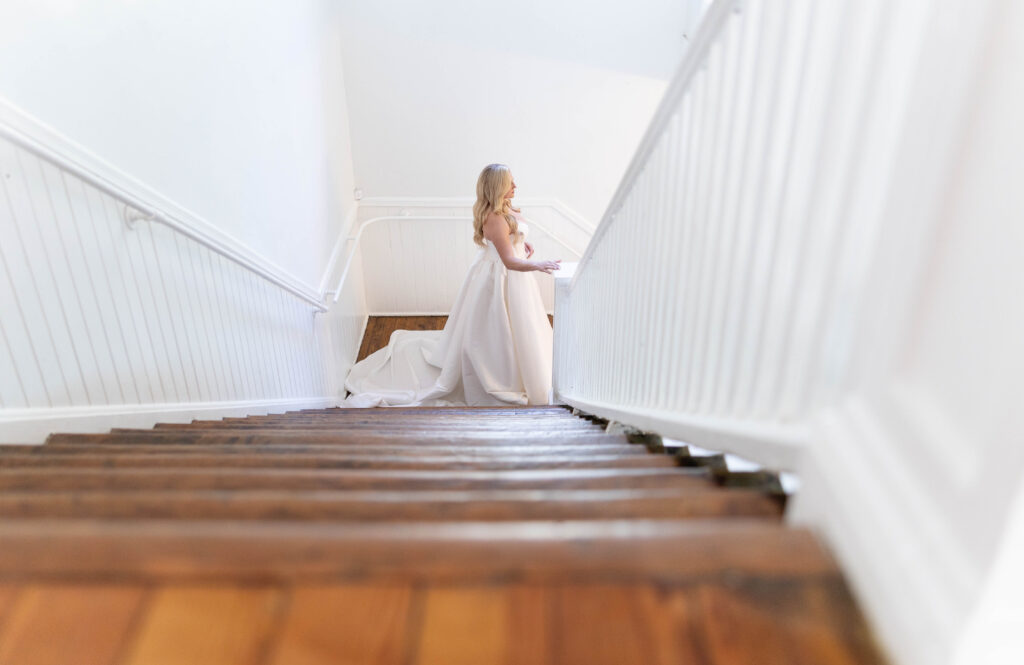 Tampa hair and makeup | Makeup Artist Orlando Beauty Brigade | Bride walking down the stairs