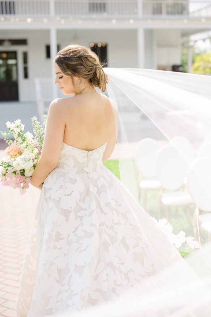 Orlando makeup bridal | Makeup Artist Orlando Beauty Brigade | Bride with a styled low bun and veil